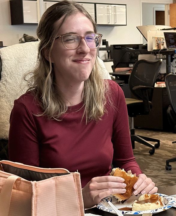 Lightning Kite Employee loving the brisket sandwich